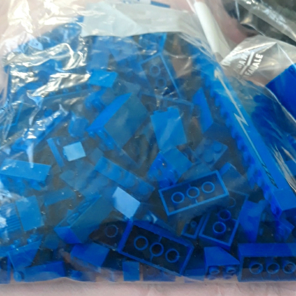Blue or black bag legos tires one bag vintage pieces
